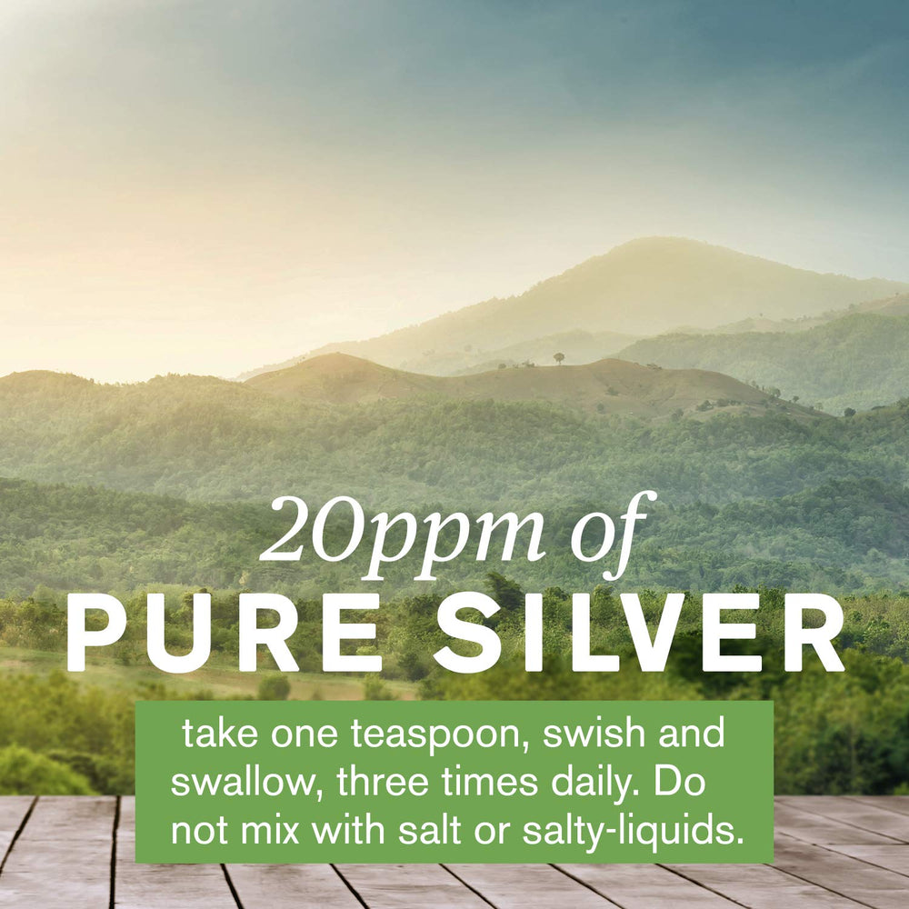 Nature's Sunshine Silver Shield Liquid on a clean surface with water-like suspension