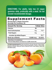Nature's Truth Biotin Gummies peach gummies closeup with chewy texture.
