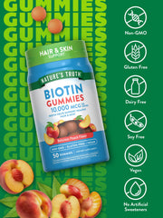 Nature's Truth Biotin Gummies peach label highlights vegan, gluten-free formula.
