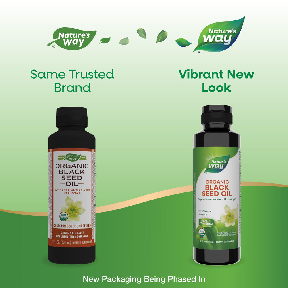 Pouring Nature's Way Black Seed Oil from a glass bottle for daily use.