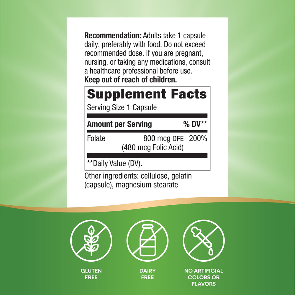 Nature's Way Folic Acid capsules in hand for convenient daily dosage