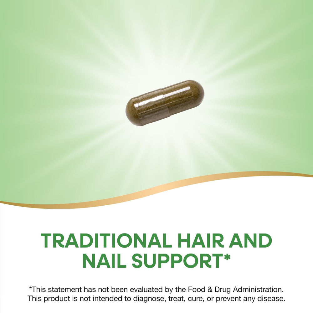 Close-up of capsules emphasizing 440 mg per serving and vegan formula.