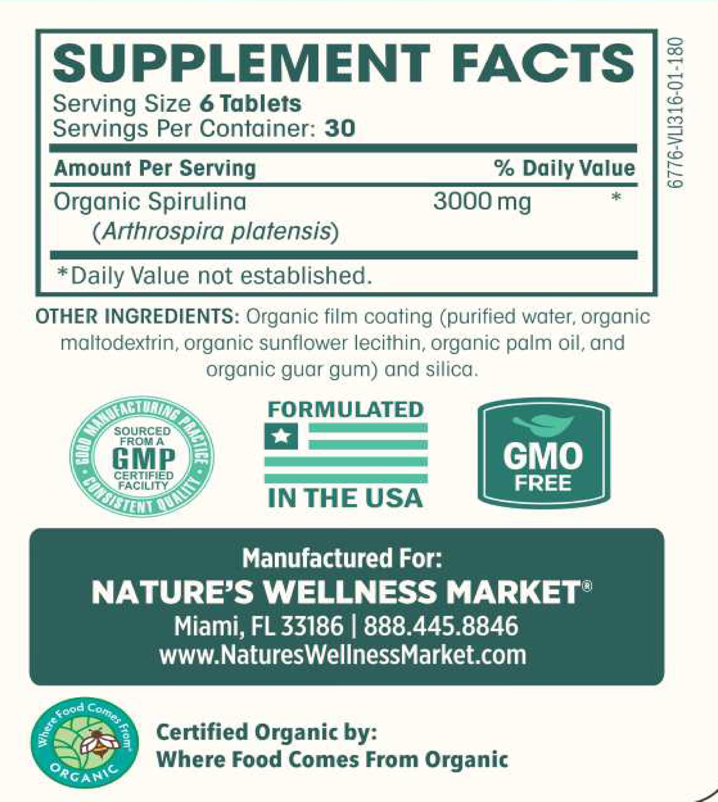 Natures Wellness Spirulina capsules being poured from bottle illustrate easy daily dosing.