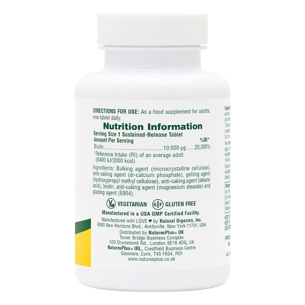 Close-up of vegetarian Biotin tablets inside a bottle for daily use