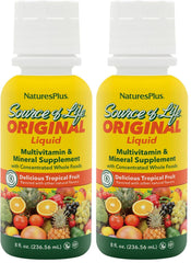 NaturesPlus Source of Life Liquid tropical fruit bottle on countertop, rich in essential nutrients for daily energy support