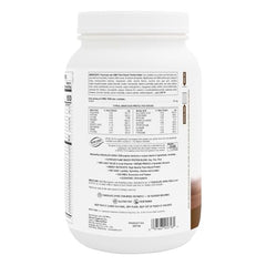 NaturesPlus SpirU-Tein chocolate shake in glass, plant-based protein delight.