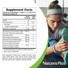 Glass and spoon showing measured daily dose of NaturesPlus Rx-Joint Liquid