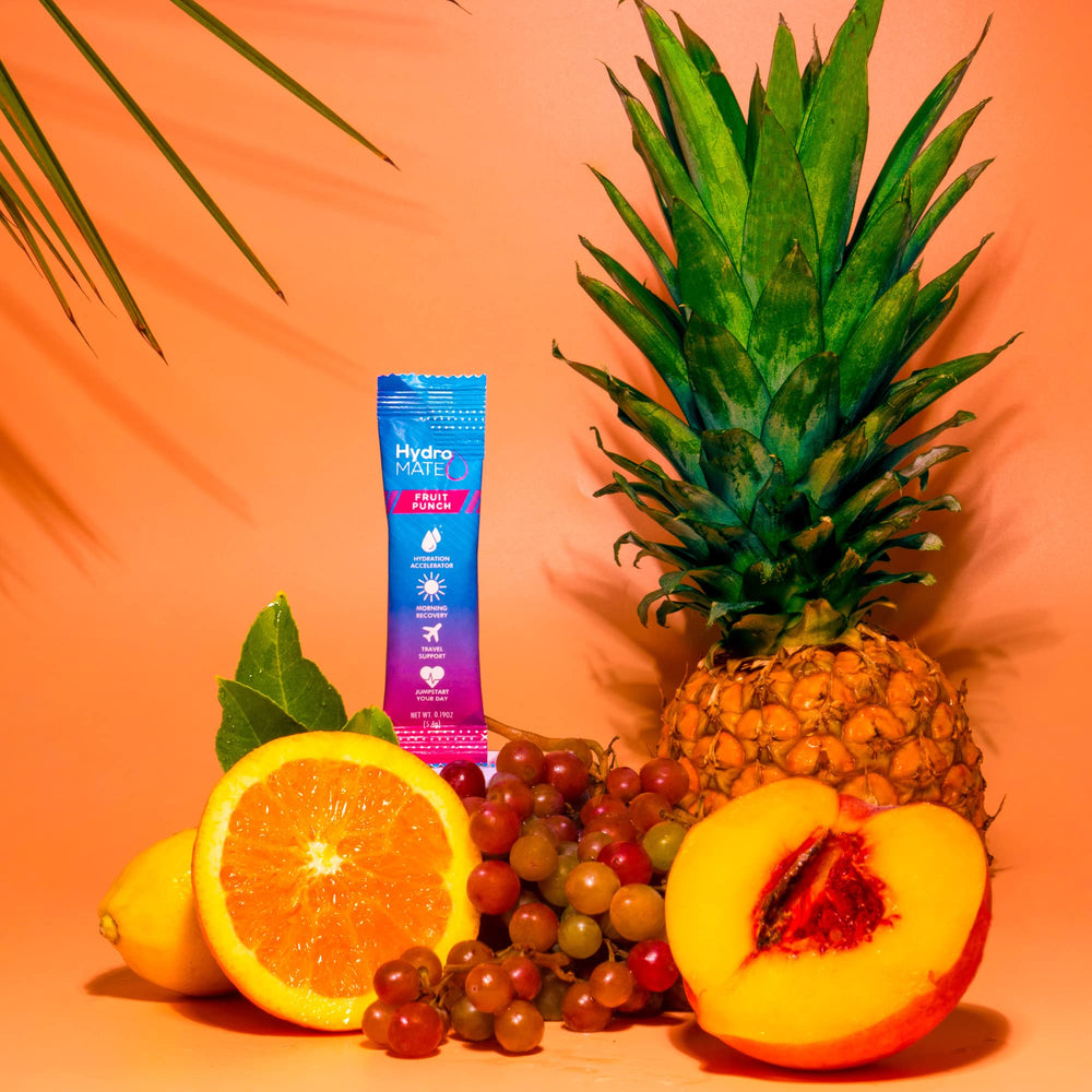 Travel-ready HydroMATE Fruit Punch travel pack placed in a backpack.