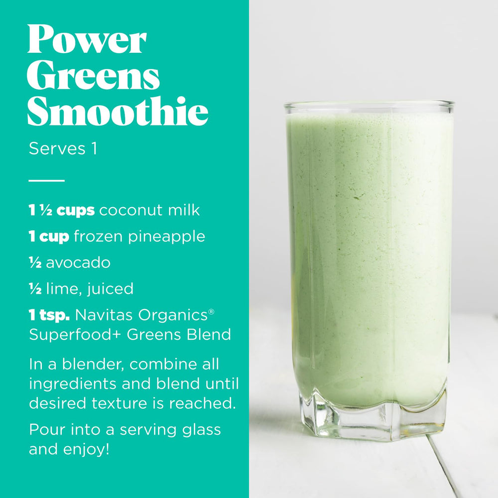 Navitas Organics Superfood+ greens blend being poured into liquid