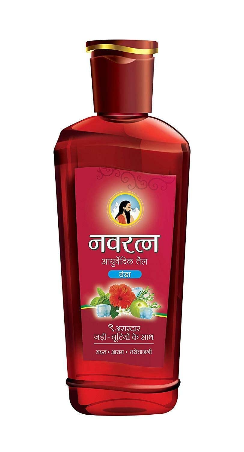 Navratna Cool Oil ingredients blend close-up showing herbal cooling formula