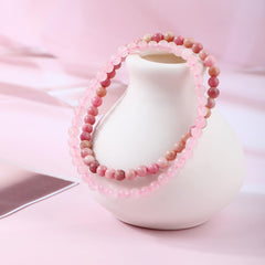 NCB rhodochrosite heart chakra tones in a graceful bracelet shot
