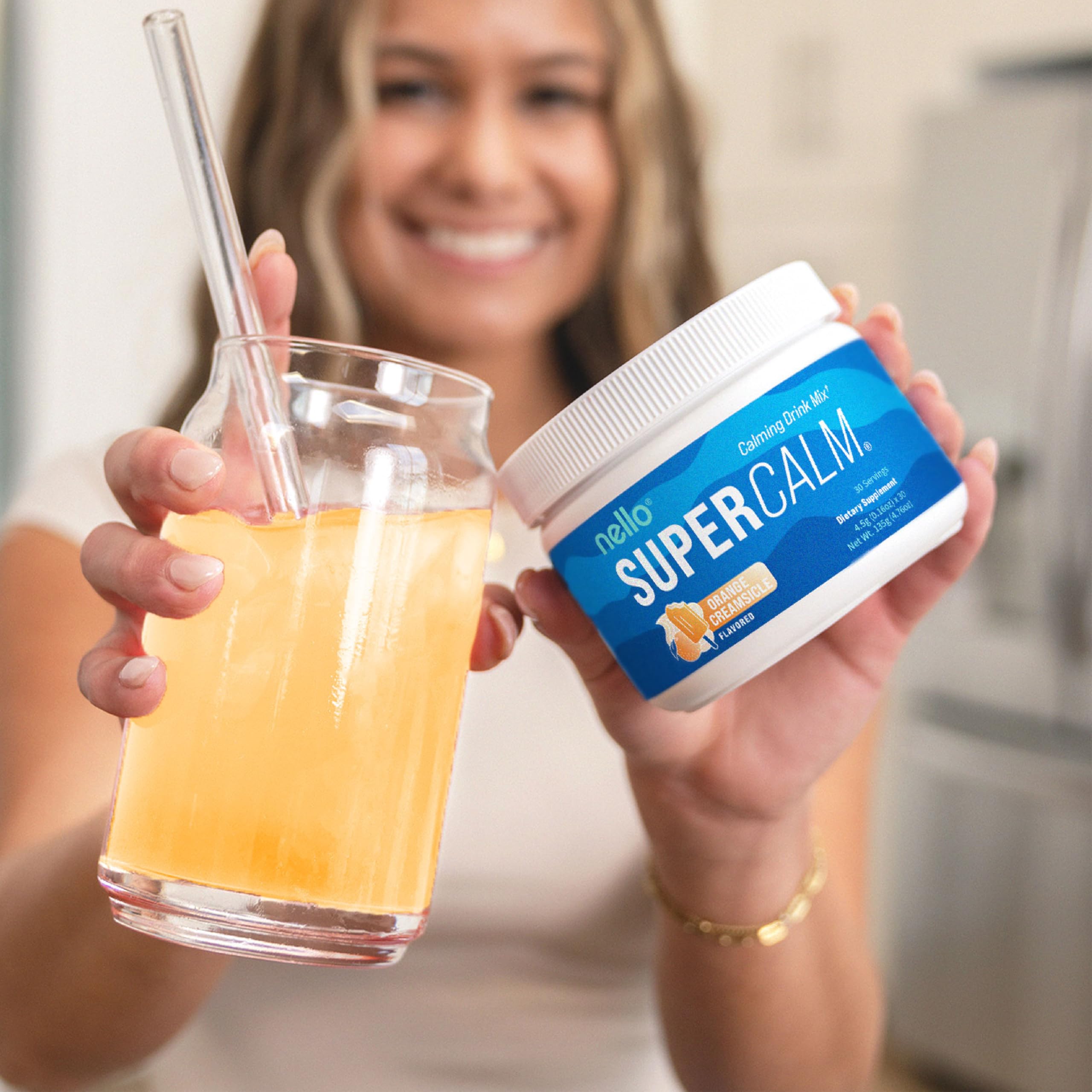 Nello Supercalm dissolving in water creates a refreshing orange drink.