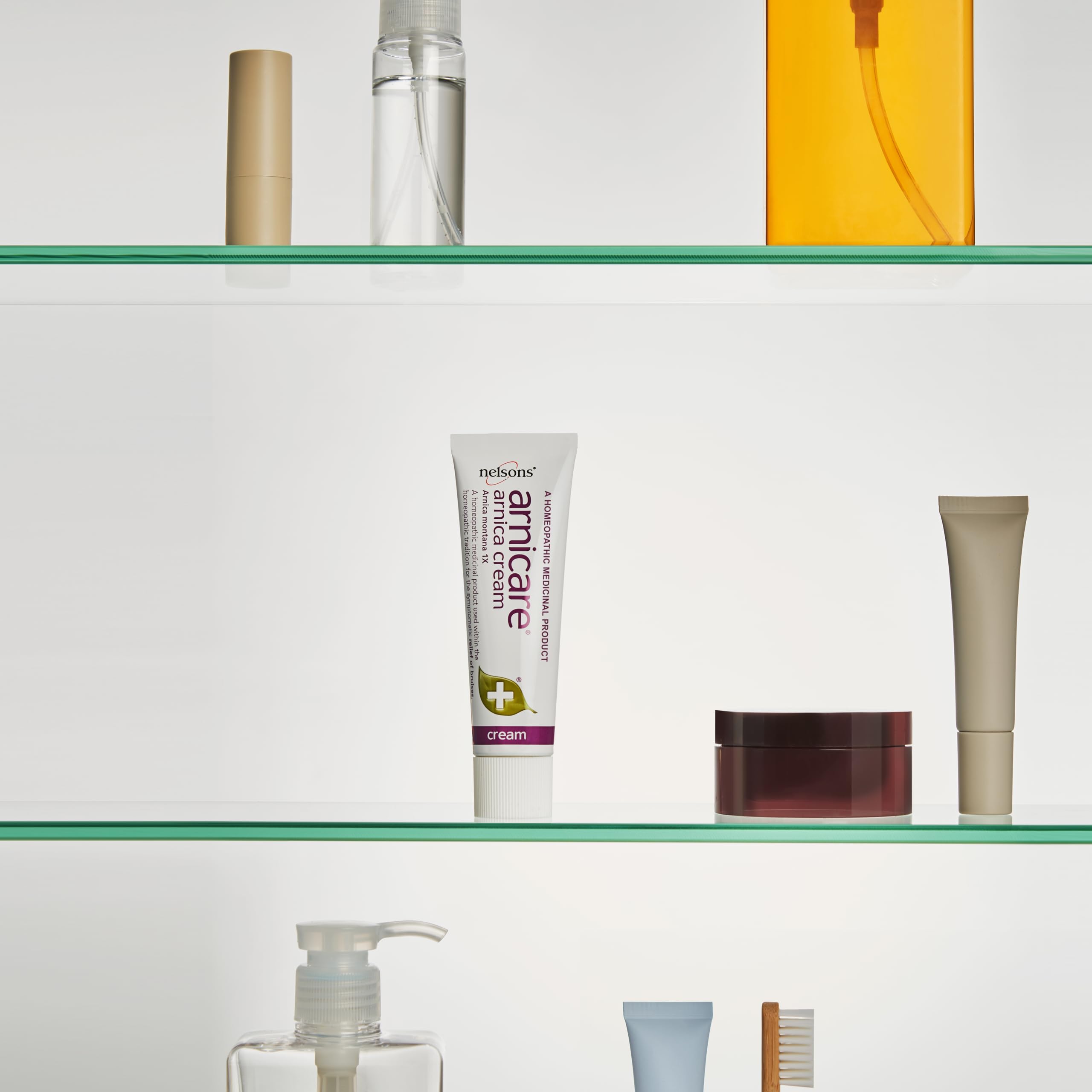 Nelsons Arnicare Arnica Cream on bruised area illustrating external-use topical care.