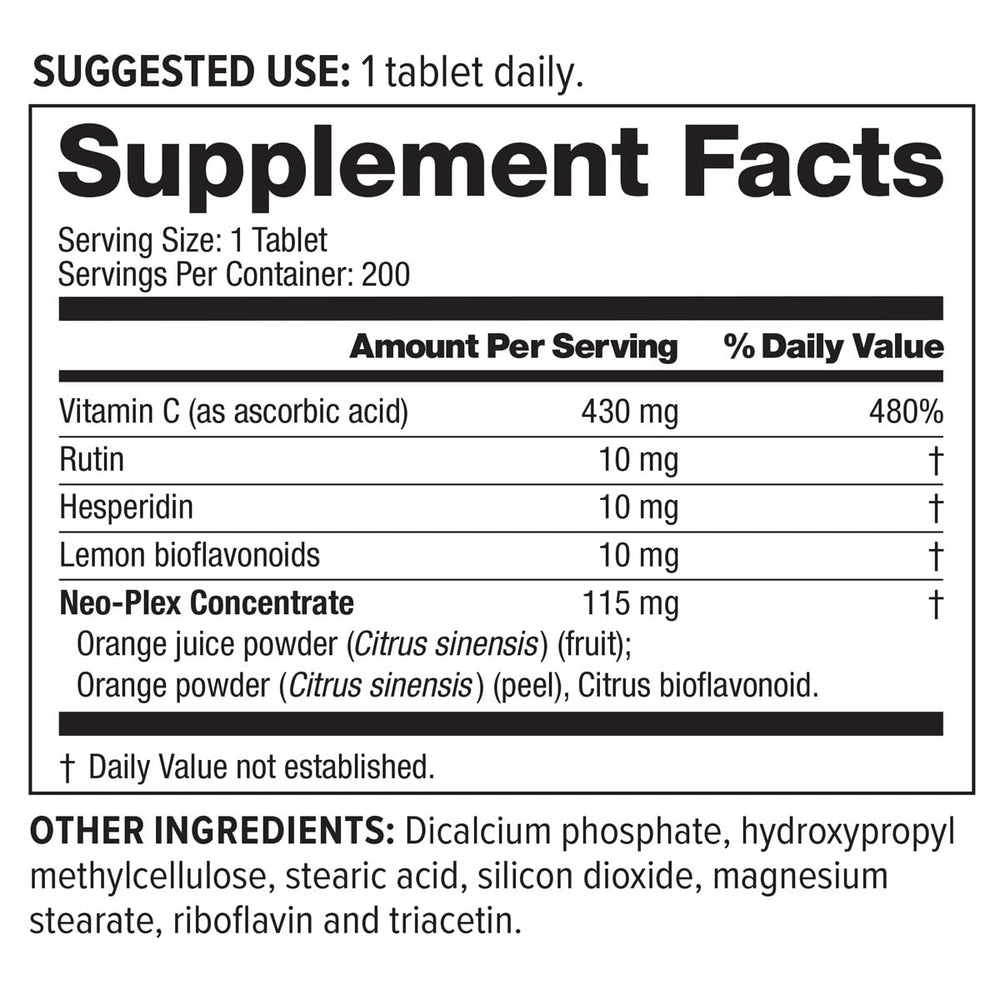 NeoLife Super C daily-use setup with glass of water for easy supplementation.