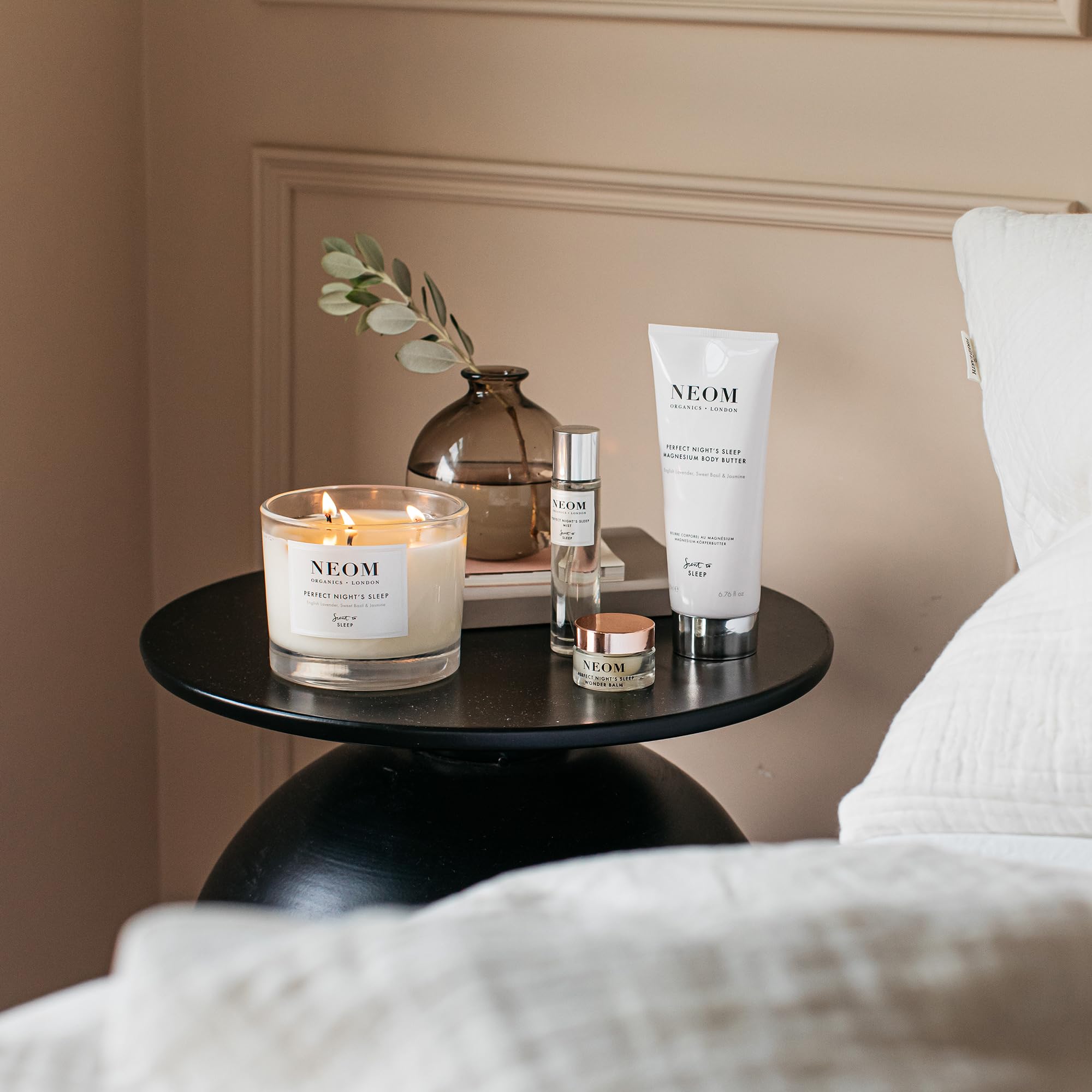 Illustration of NEOM lavender and chamomile scent notes suggesting relaxation