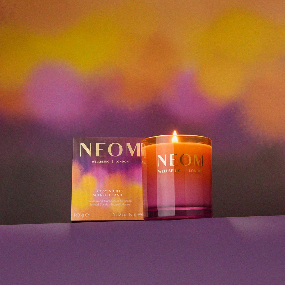 Neom Cosy Nights Candle highlighting nutmeg notes for festive warmth