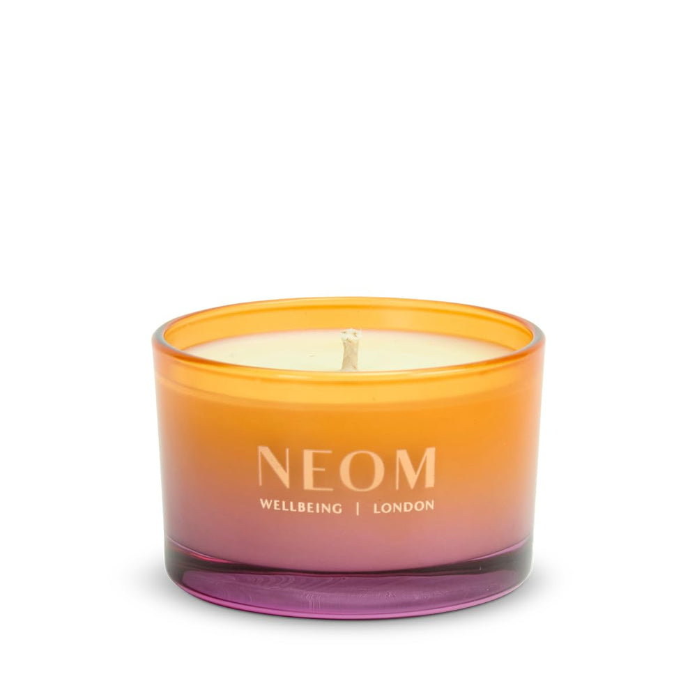 Neom Cosy Nights Travel Candle gift-ready packaging signals premium gifting.
