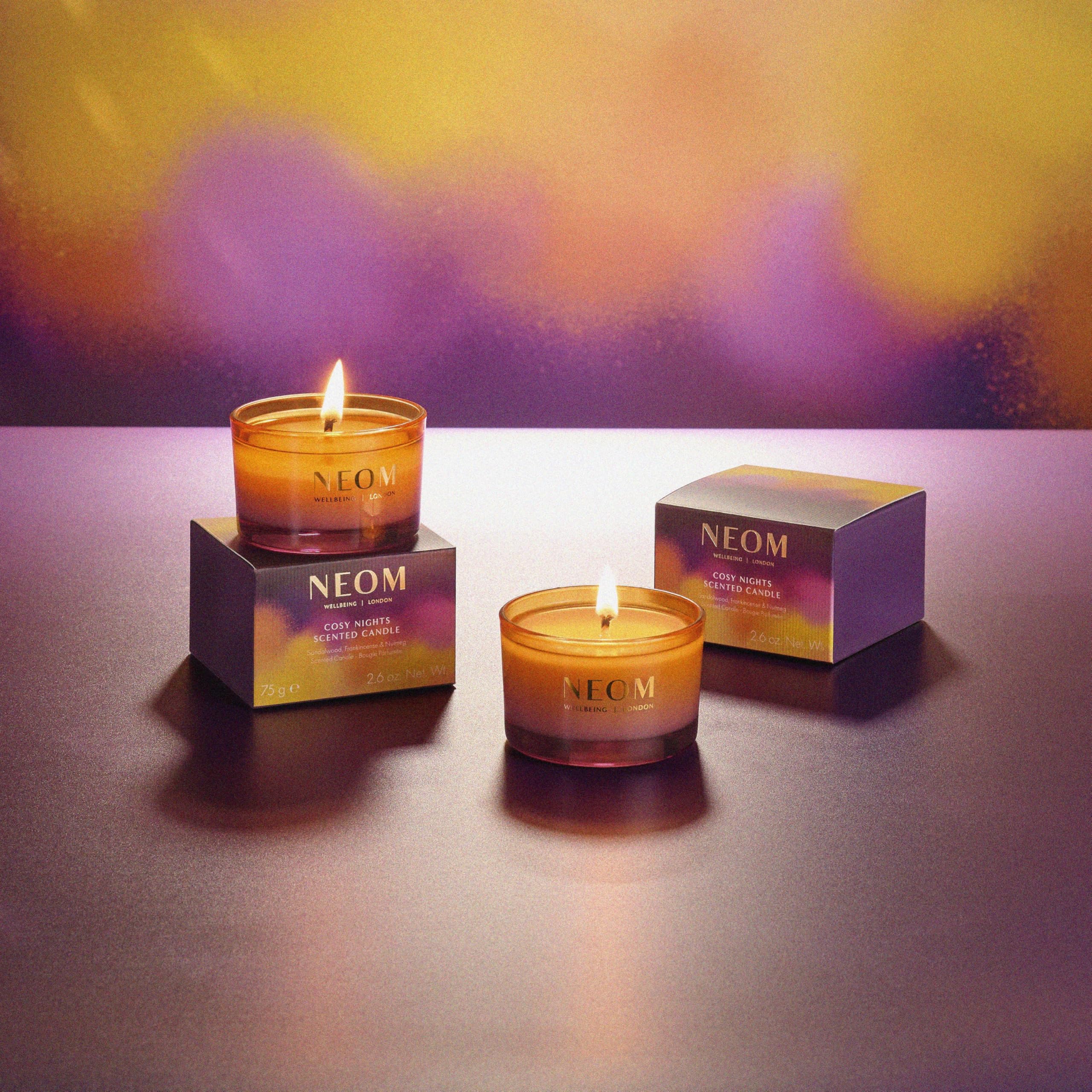 Neom Cosy Nights Travel Candle nutmeg aroma highlights festive coziness.