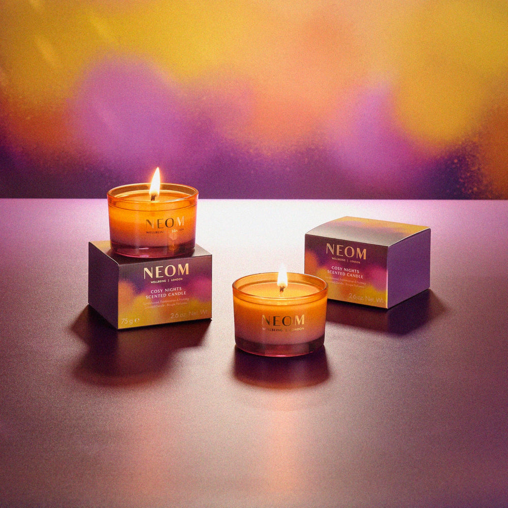 Neom Cosy Nights Travel Candle nutmeg aroma highlights festive coziness.
