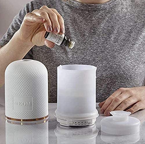 NEOM diffuser water tank usage demonstrates a simple heatless mist for calm rooms.