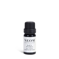 NEOM essential oil blend jasmine bottle releases uplifting notes for mood balance.