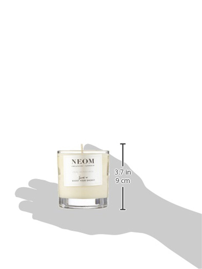 Neom Feel Refreshed wax detail emphasizing natural materials and clean burn