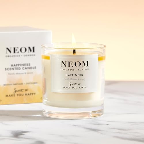 NEOM Happiness candle label close-up emphasizing natural wax for clean burn.