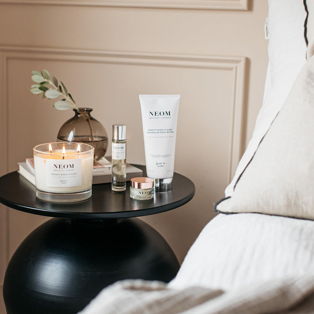 Neom Perfect Night's Sleep Mist bottle cap closeup emphasizes 100% natural fragrances.