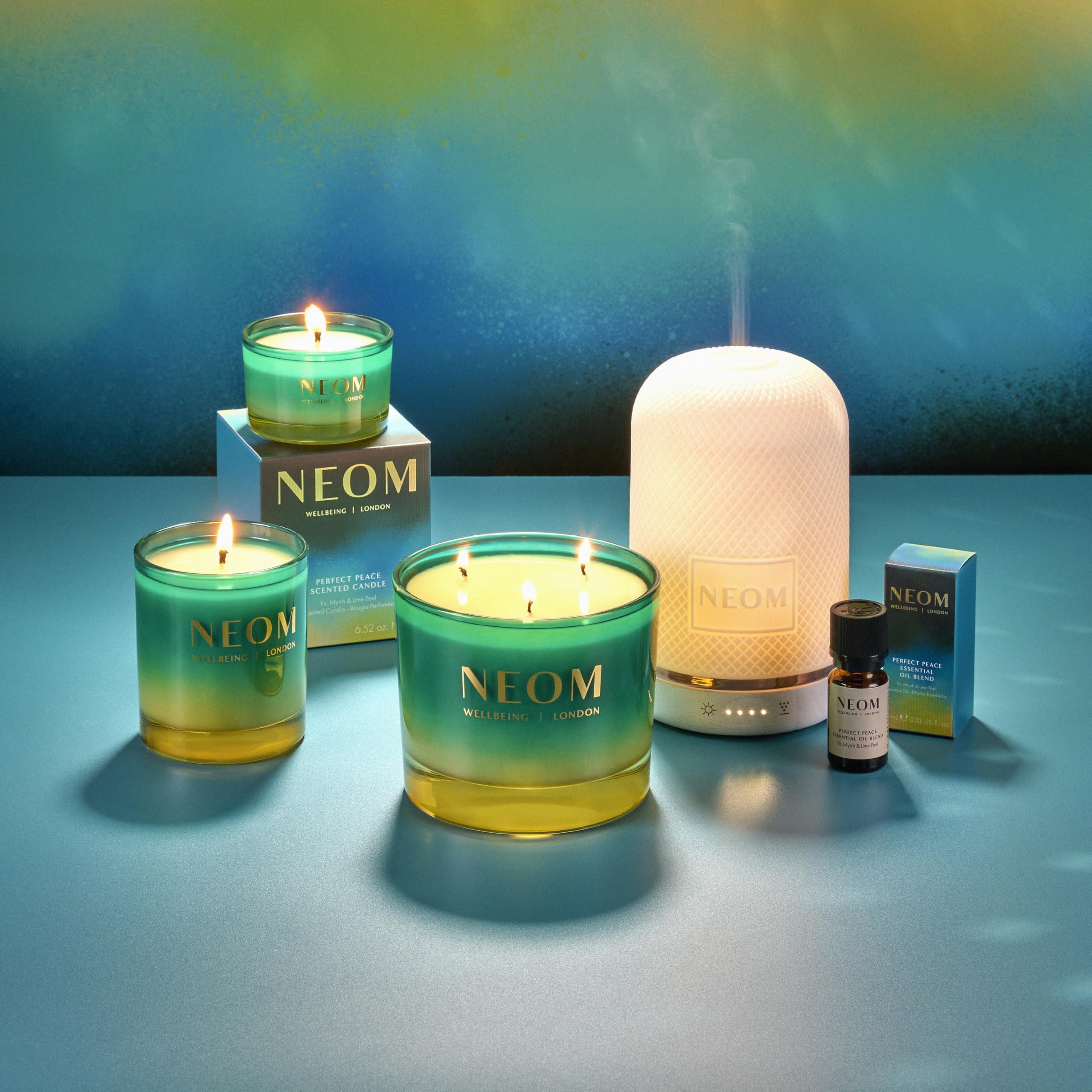 NEOM Perfect Peace candle trio setup for a luxurious table centerpiece