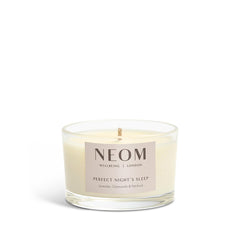 Neom Scent to Sleep candle featuring English lavender, chamomile, and patchouli aromas for unwinding.