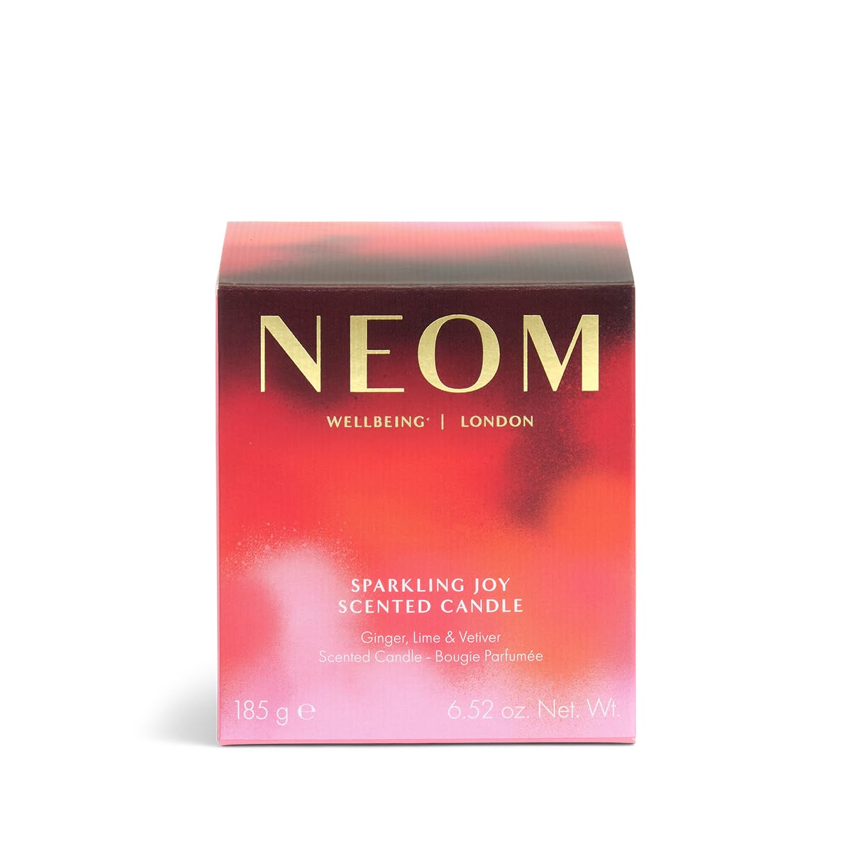 NEOM Sparkling Joy on a shelf highlights a premium wellbeing fragrance for gifts.