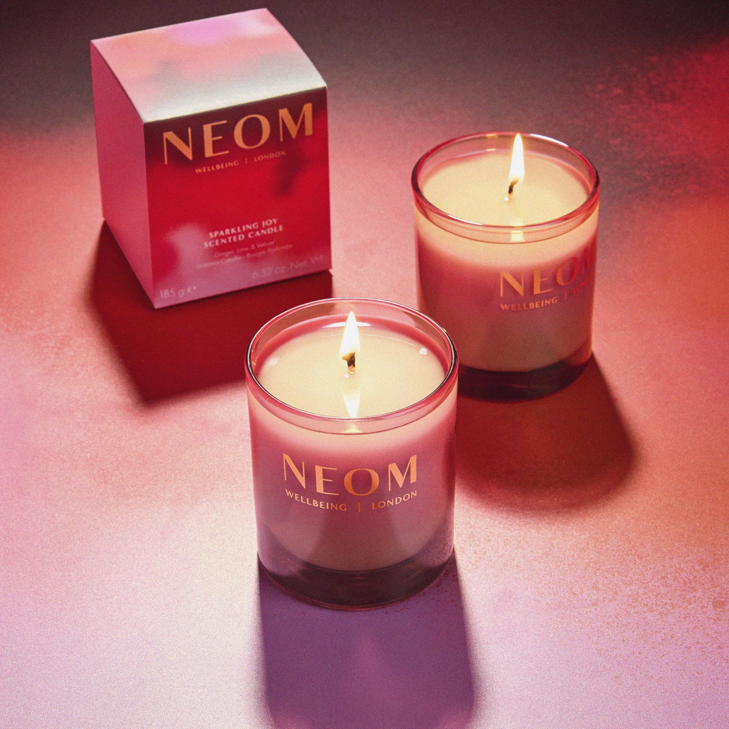 NEOM Sparkling Joy gift packaging styled for festive gifting and wellbeing.