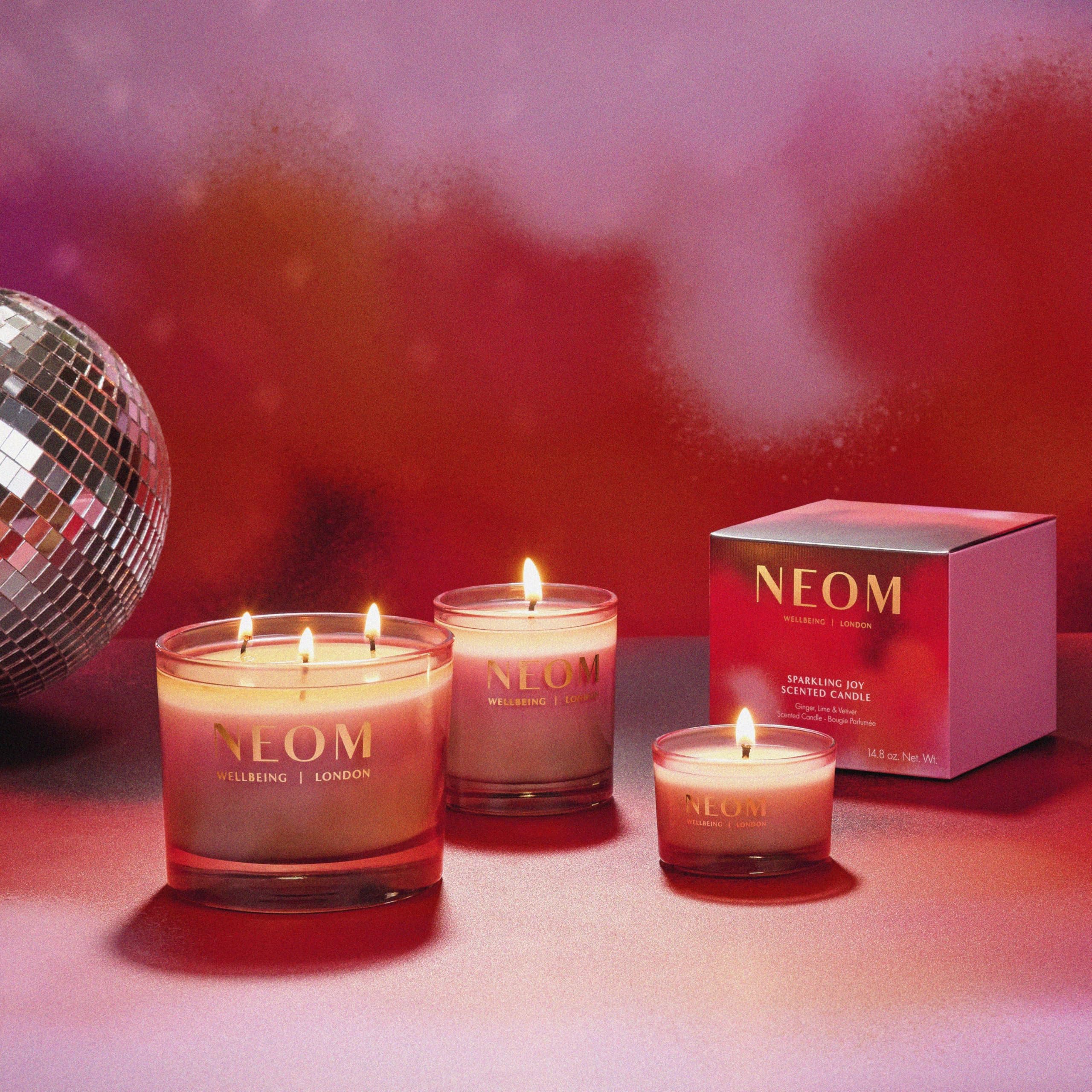 NEOM Sparkling Joy wick trimming guide demonstrating best burn practices.