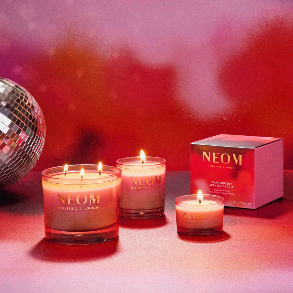 NEOM Sparkling Joy wick trimming guide demonstrating best burn practices.