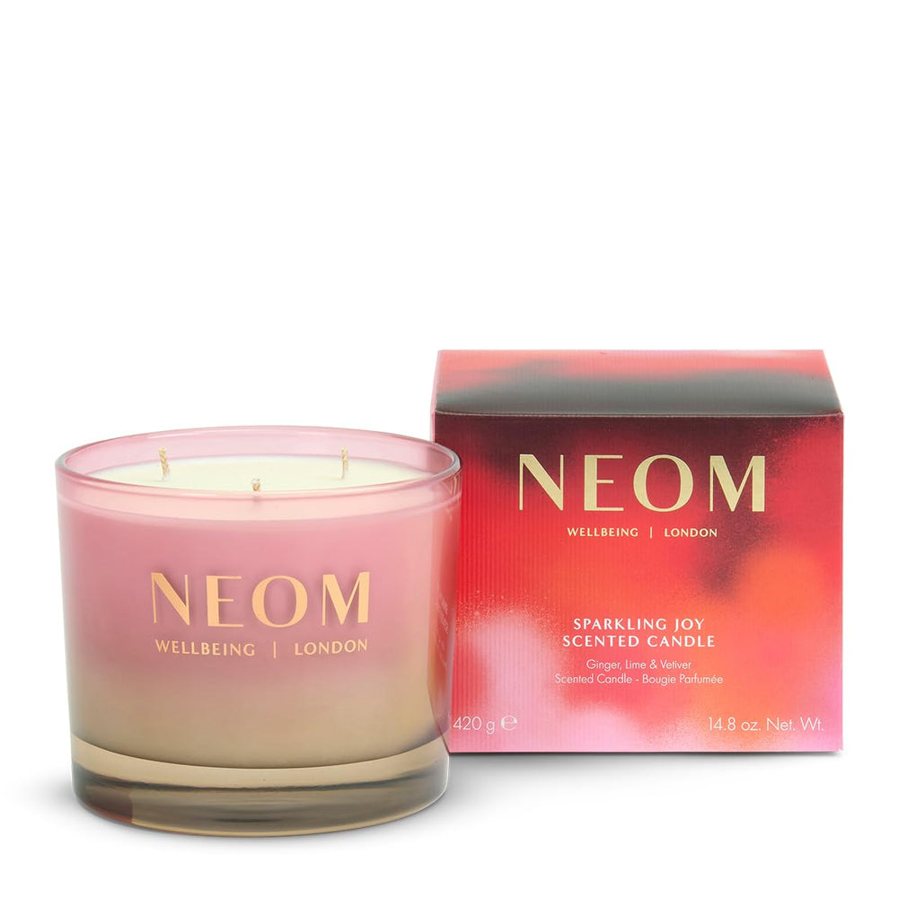 NEOM Sparkling Joy ginger-lime-vetiver candle for uplifting moments and inviting fragrance.
