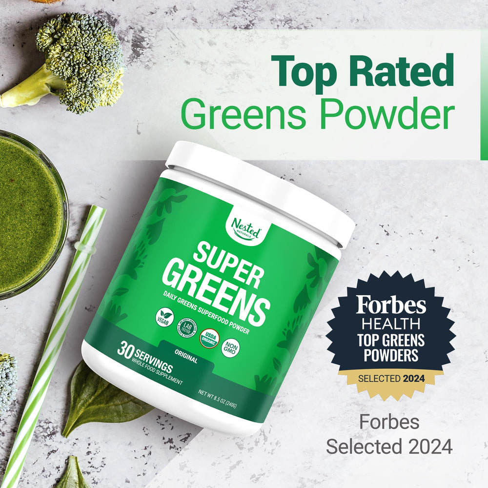 Scoop of Nested Naturals Super Greens added to a glass for a quick boost.