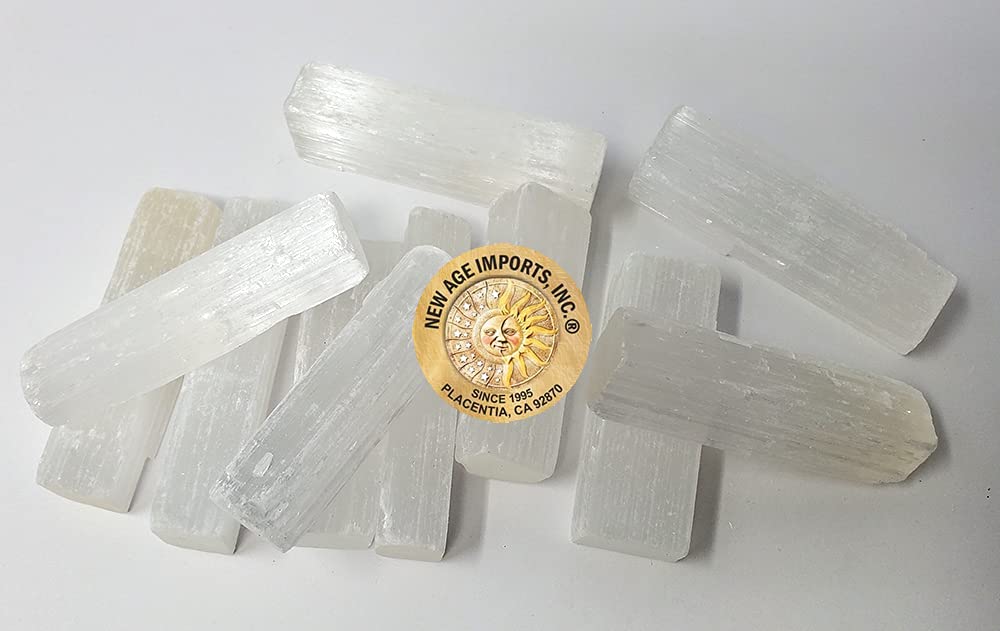 New Age Imports 1 lb selenite sticks add calming ambiance and chakra balance.