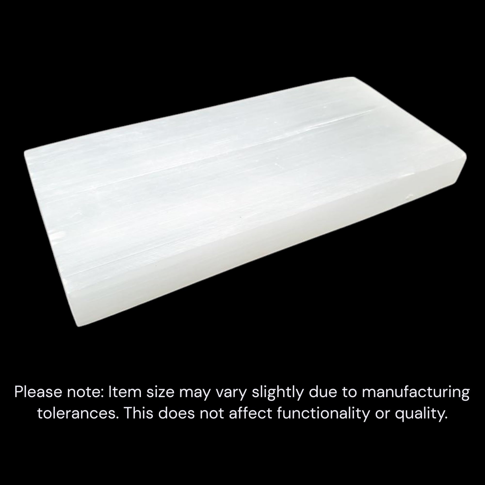 Gift-ready display of New Age Imports selenite charging plate for decor or gifting.