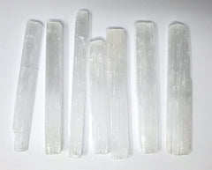 New Age Imports selenite stick 5-6 inch for meditation and energy clearing.
