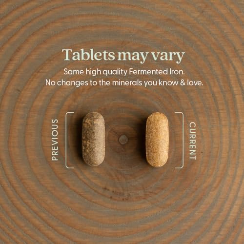 New Chapter bottle opened showing easy-to-swallow tablets.