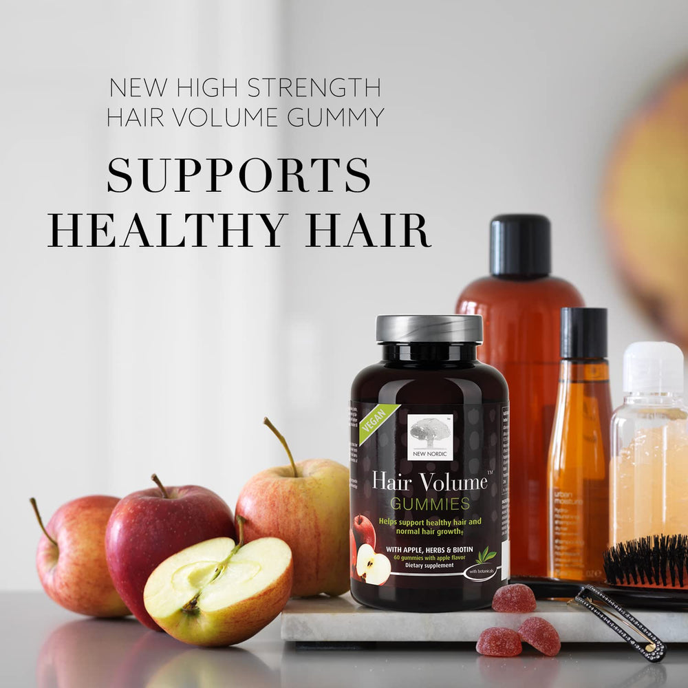 New Nordic Hair Volume Gummies close-up highlighting apple flavor and chewy texture.