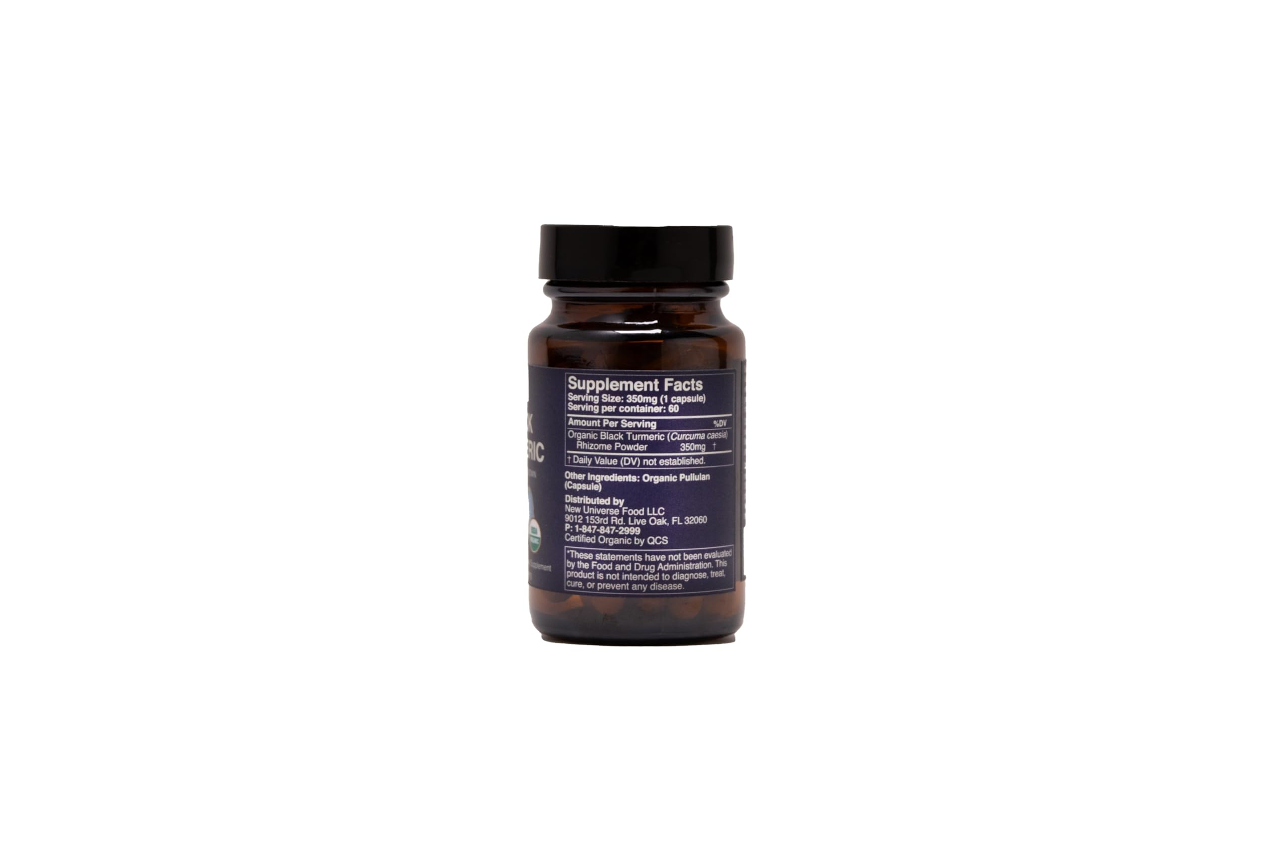 New Universe Food Black Turmeric capsules close-up, easy-to-swallow vegan capsules for daily use.