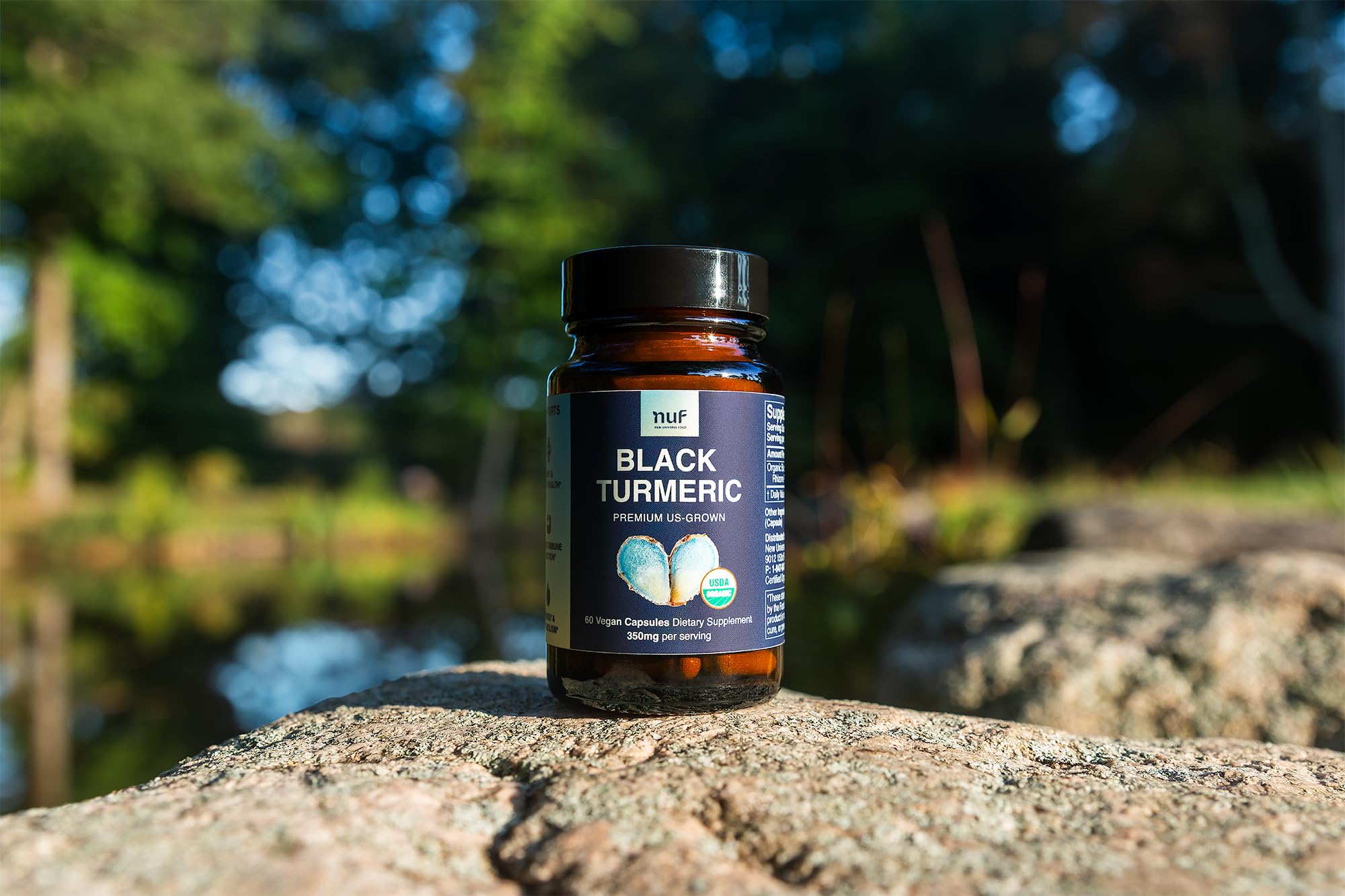 New Universe Food Black Turmeric product with certification logo indicating quality and testing.