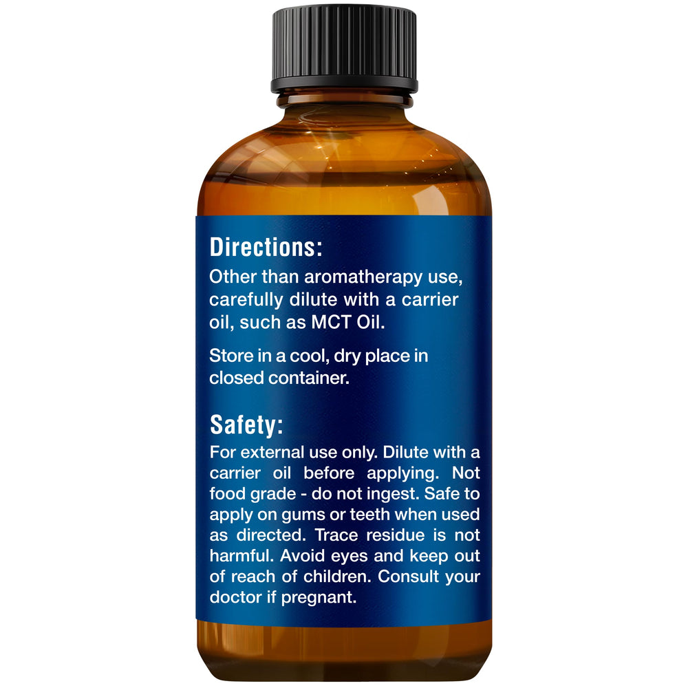 Nexon Botanics clove oil on wooden table evokes warm aroma rituals.