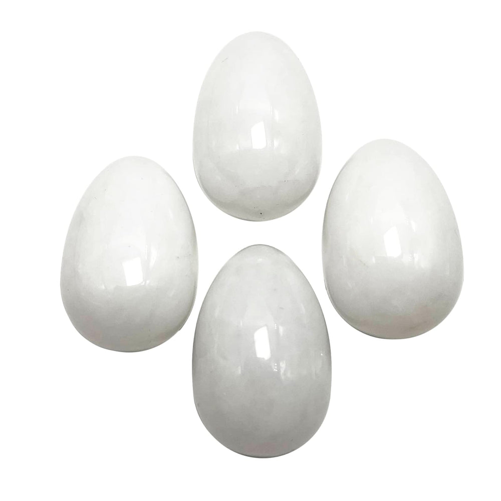Neyisaa mini stone egg pack of four, polished for display.
