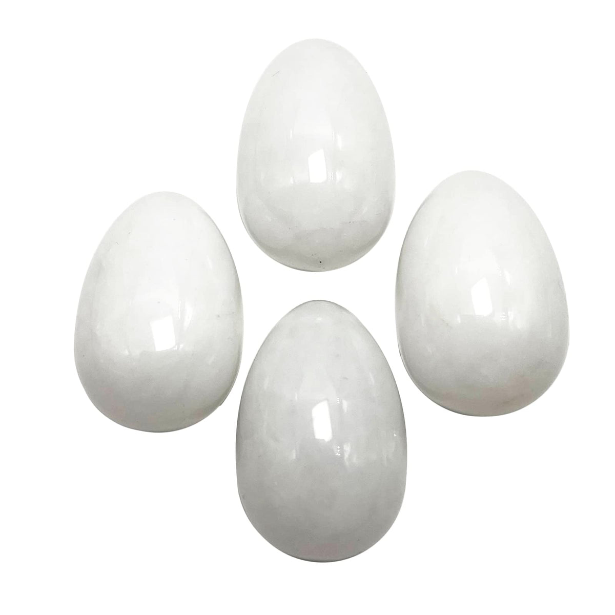 Neyisaa mini stone egg pack of four, polished for display.