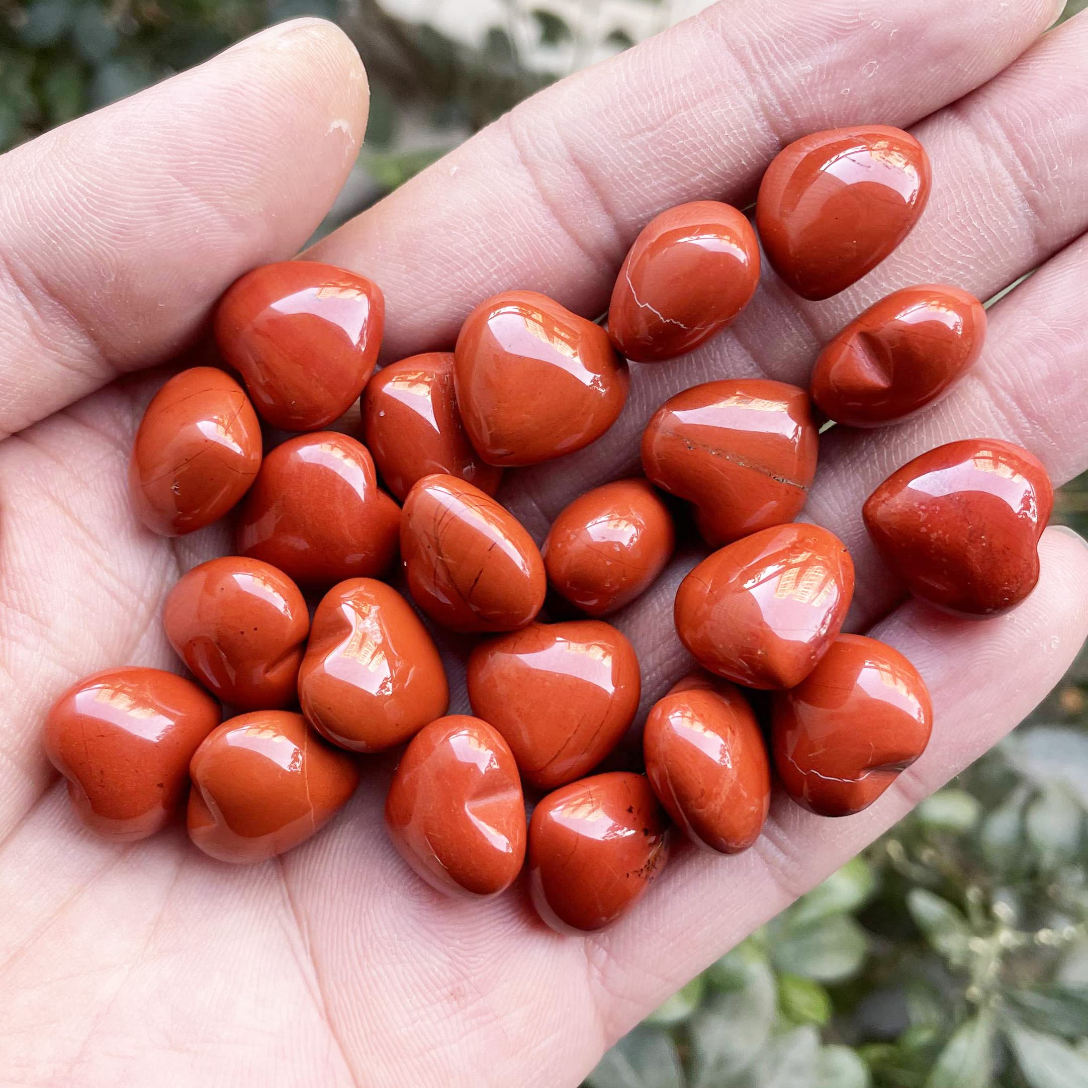 Neyisaa polished red jasper heart stones for decor and mindful relaxation.
