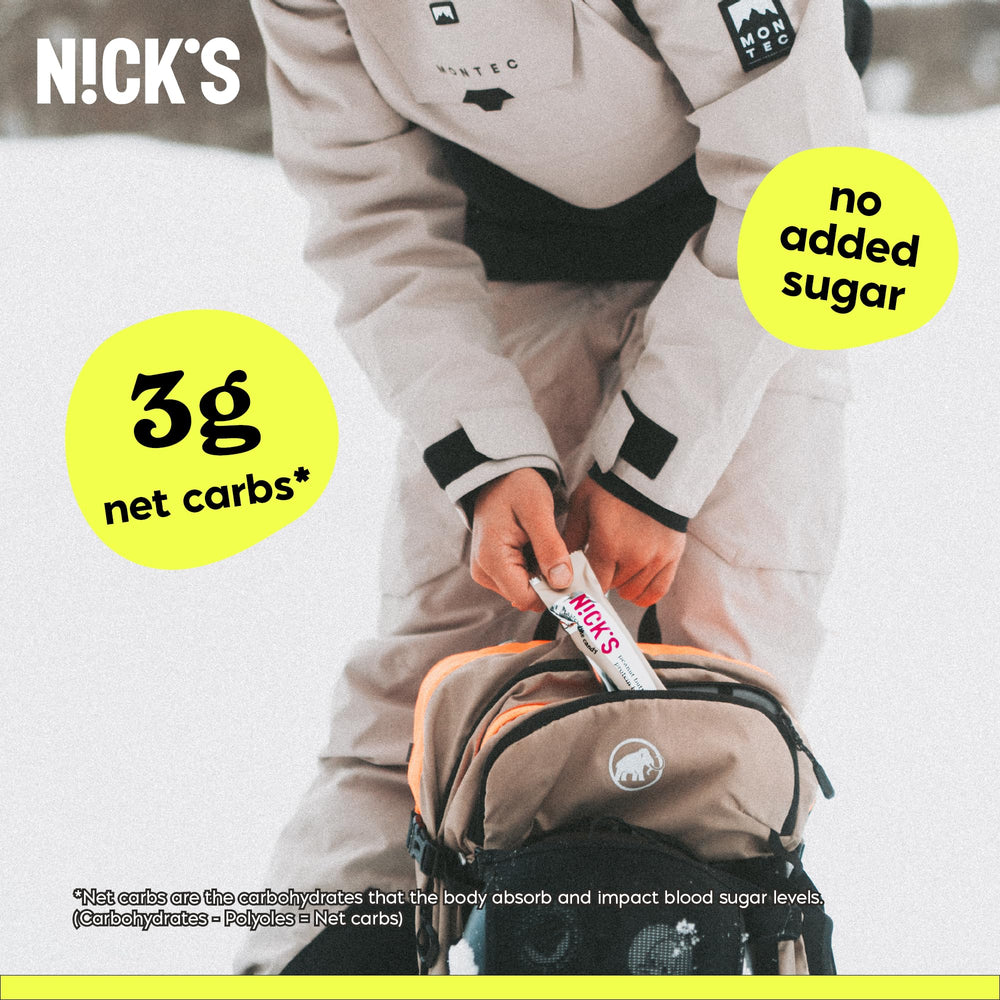 N!CK'S bar broken open reveals texture and gooey caramel center.