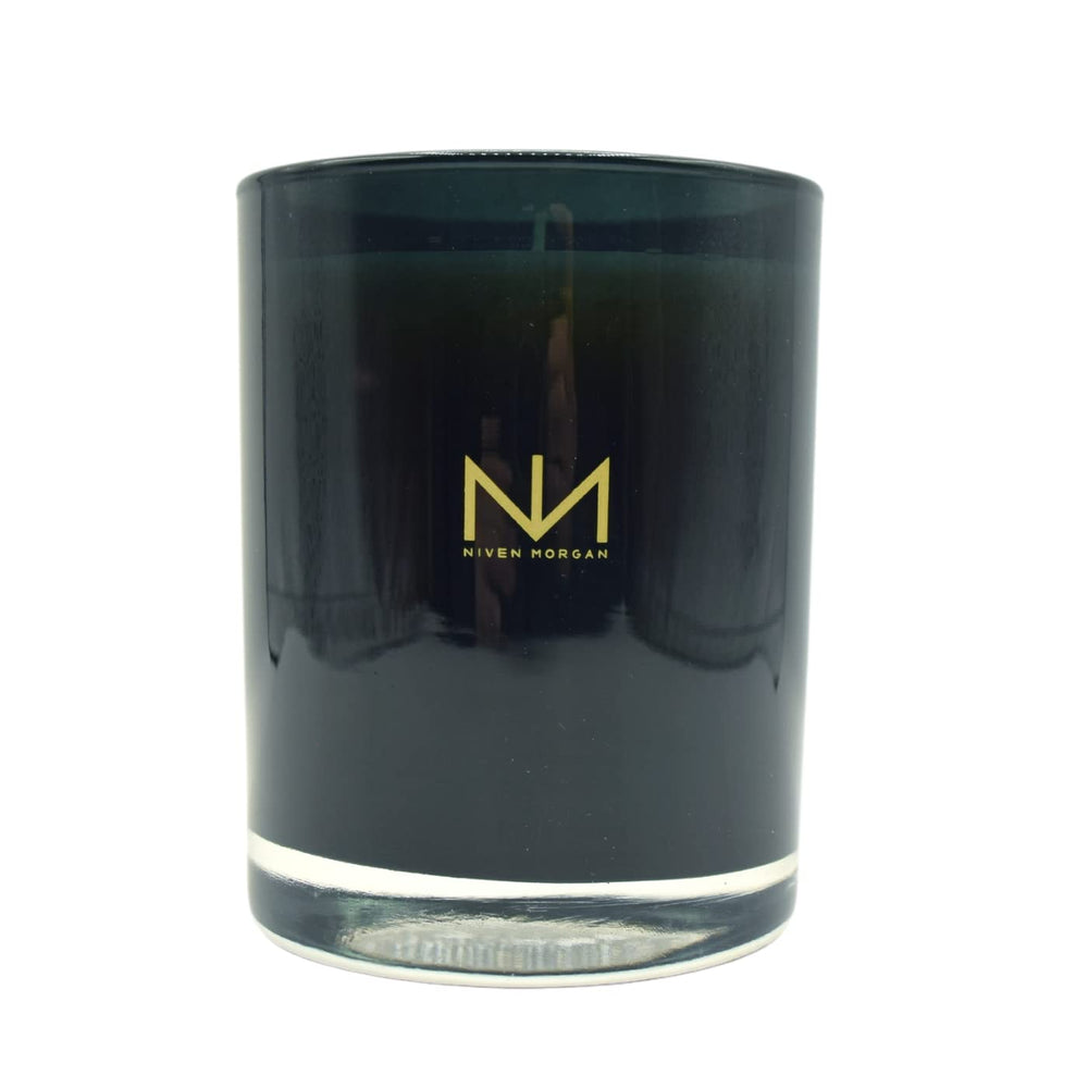 Niven Morgan Mandarin-Teak-Rosewood candle flame close-up for warm ambiance