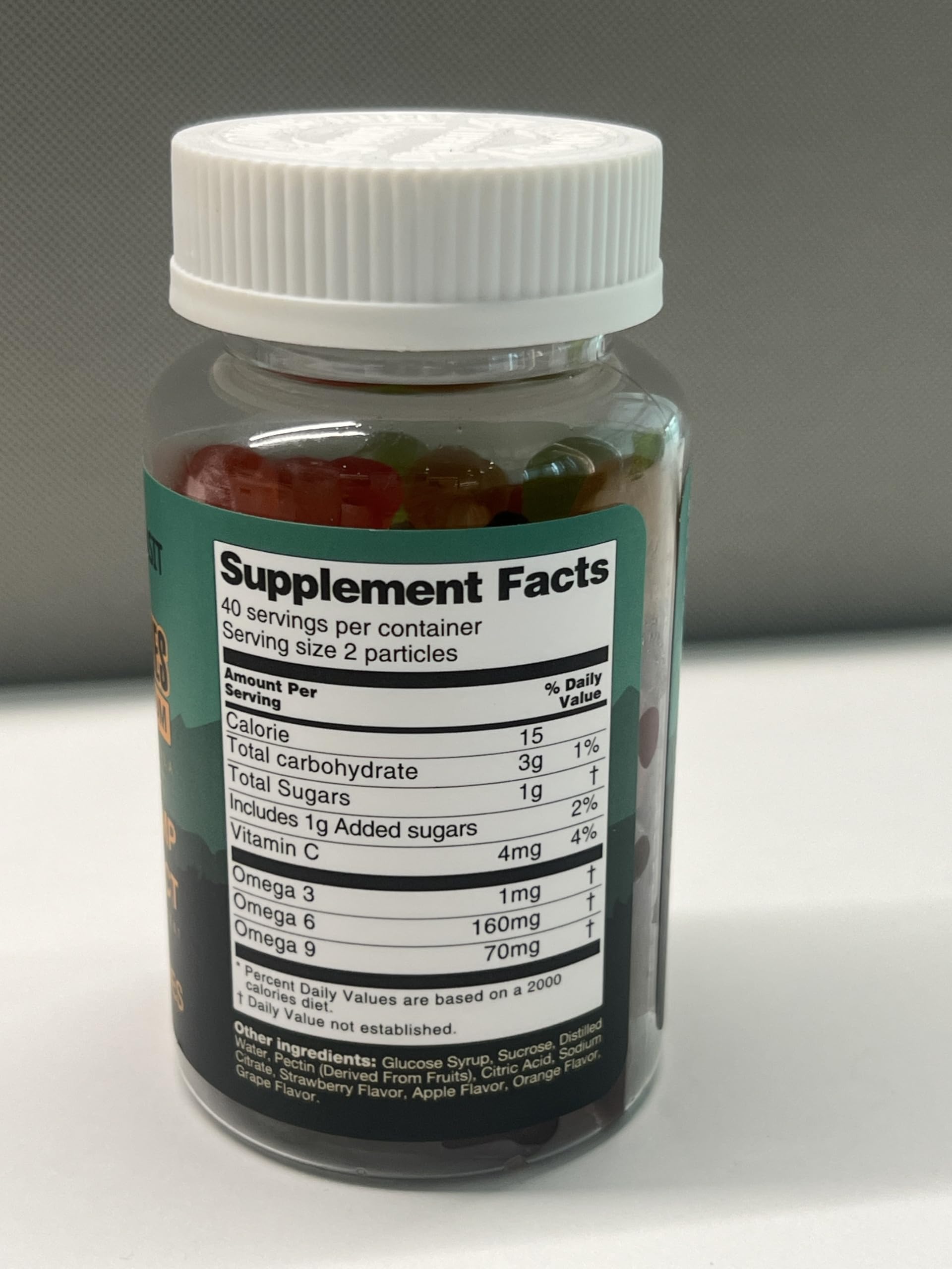 NLMUBR LUCKSIT Natural Omega Gummies close-up highlighting organic vegan formula